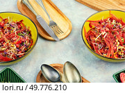 Tasty salad made from a mixture of sprouted alfalfa, beans, red radish with pomegranate and black carrots.. Diet vegan sprouts salad. Стоковое фото, агентство Ingram Publishing / Фотобанк Лори
