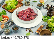 Raw deer meat for venison ragout or goulash.. Raw deer meat, raw meat. Стоковое фото, агентство Ingram Publishing / Фотобанк Лори