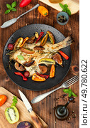Roasted flounder fish, flatfish on rustic wooden table.. Fried flounder fish. Стоковое фото, агентство Ingram Publishing / Фотобанк Лори