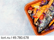 Baked fish mackerel with baked potato or yam. Healthy dinner. Space for text.. Grilled fish, mackerel, fish dish. Стоковое фото, агентство Ingram Publishing / Фотобанк Лори