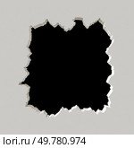 Irregular black hole in white wall with jagged edges. 3d render. Irregular black hole in white wall. Стоковое фото, агентство Ingram Publishing / Фотобанк Лори