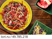 Healthy vegetarian bowl dish with fresh flaxseed sprouts.. Healthy salad with sprouts and lettuce. Стоковое фото, агентство Ingram Publishing / Фотобанк Лори