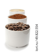 cups with coffee beans, blend and espresso. closeup. Стоковое фото, агентство Ingram Publishing / Фотобанк Лори