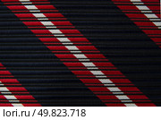 Closeup view of a striped neck tie, could be used as a background. Стоковое фото, агентство Ingram Publishing / Фотобанк Лори