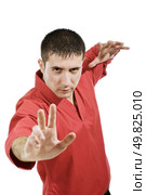 serious man in red kimono. Стоковое фото, агентство Ingram Publishing / Фотобанк Лори