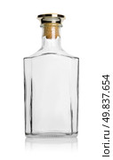 Empty bottle of cognac isolated on a white background. Стоковое фото, агентство Ingram Publishing / Фотобанк Лори