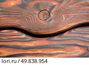 Horizontal old wooden board painted dark color. Стоковое фото, агентство Ingram Publishing / Фотобанк Лори