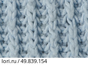 Blue knitted wool texture can use as background. Стоковое фото, агентство Ingram Publishing / Фотобанк Лори