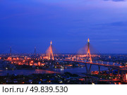 Bhumibol Bridge in Thailand, also known as the Industrial Ring  Bridge or Mega Bridge, in Thailand. The bridge crosses the Chao Phraya River twice. Стоковое фото, агентство Ingram Publishing / Фотобанк Лори