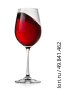 Waving red wine in a glass isolated on a white background. Стоковое фото, агентство Ingram Publishing / Фотобанк Лори