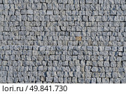 Cobbled pavement pattern made of granite cubes. Стоковое фото, агентство Ingram Publishing / Фотобанк Лори