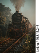 An old steam locomotive from the 19th century stands on the rails. Стоковое AI-изображение, AI-художник Александр Поташев / Фотобанк Лори