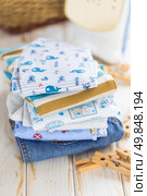 Baby clothes. Стоковое фото, агентство Ingram Publishing / Фотобанк Лори