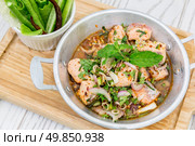 Thai Style Spicy Salmon salad with fresh vegetable. Стоковое фото, агентство Ingram Publishing / Фотобанк Лори