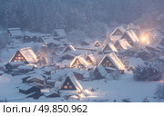 Shirakawago light-up with Snowfall Gifu Chubu Japan. Стоковое фото, агентство Ingram Publishing / Фотобанк Лори