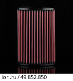 Air cone filter on black background. Vehicle Modification Accessories. Стоковое фото, агентство Ingram Publishing / Фотобанк Лори