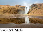 skogafoss waterfall and its reflection on the South of Iceland near the town Skogar. Стоковое фото, агентство Ingram Publishing / Фотобанк Лори