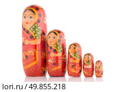 Five red Babushka on white reflective background. Стоковое фото, агентство Ingram Publishing / Фотобанк Лори