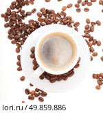 coffee in a white cup with scattered grains. Isolated on white background. Стоковое фото, агентство Ingram Publishing / Фотобанк Лори