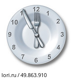 Lunch time dining concept with a fork and knife on a plate in the shape of a clock with numbers as a symbol of eating time or fast food entertainment in the food and drink catering business on a white background. Стоковое фото, агентство Ingram Publishing / Фотобанк Лори