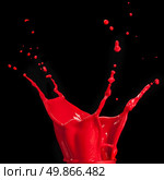 splash of red paint isolated on black background. Стоковое фото, агентство Ingram Publishing / Фотобанк Лори