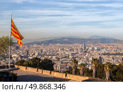 Aerial view of Barcelona city with flag of Spain. Стоковое фото, агентство Ingram Publishing / Фотобанк Лори