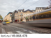 Tramway in motion on the street of Brussels near The Sablon Square. Стоковое фото, агентство Ingram Publishing / Фотобанк Лори