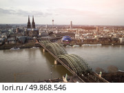View of Koeln, Germany. Gothic cathedral and steel bridge over river Rhine. Стоковое фото, агентство Ingram Publishing / Фотобанк Лори