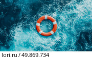 Conceptual Water Safety: Top-Down View of a Life Preserver Floating on the Ocean Surface. Стоковое AI-изображение, AI-художник Данила Большаков / Фотобанк Лори