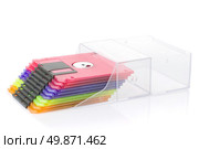 Color floppy disks in box isolated on white. Стоковое фото, агентство Ingram Publishing / Фотобанк Лори