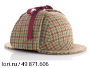 British Deerhunter or Sherlock Holmes cap on white background. Стоковое фото, агентство Ingram Publishing / Фотобанк Лори