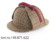 British Deerhunter or Sherlock Holmes cap on white background. Стоковое фото, агентство Ingram Publishing / Фотобанк Лори