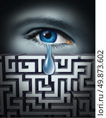 Pain management and dealing with human physical or psychological suffering with an eye crying a single tear through a maze or labrynth as a concept for finding solutions to emotional stress related to work or life. Стоковое фото, агентство Ingram Publishing / Фотобанк Лори
