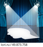 Spotlight on the brain with lights shinning a human head shaped profile on a stage with blue velvet curtains  as a mental health concept for cognitive disorders as autism or Asperger’s syndrome. Стоковое фото, агентство Ingram Publishing / Фотобанк Лори
