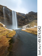 seljalandsfoss waterfall on the South of Iceland. Стоковое фото, агентство Ingram Publishing / Фотобанк Лори