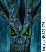 Haunted tree with a mythical dark forest and an evil plant shaped as a demon spirit skull face as a halloween or ghost related concept of monsters and imaginary creatures from folklore. Стоковое фото, агентство Ingram Publishing / Фотобанк Лори