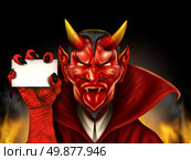 Devil holding a blank sign as a red demon halloween monster character with a devilish evil grin wearing a cape as a spooky concept with a communicating horned beast creature. Стоковое фото, агентство Ingram Publishing / Фотобанк Лори