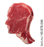 Human carnivore food concept with a red meat steak in the shape of a head as a symbol of agriculture diet and nutrition from animal flesh as a source of protien and thinking about the risks and benefits. Стоковое фото, агентство Ingram Publishing / Фотобанк Лори