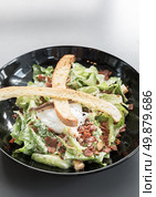 bowl of green caesar salad . Стоковое фото, агентство Ingram Publishing / Фотобанк Лори