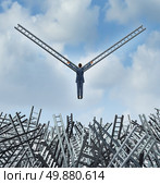 New leadership solutions business concept with a businessman rising up from a group of confused tangled ladders using the ladder metaphor as bird wings to escape and fly towards opportunity and financial freedom. Стоковое фото, агентство Ingram Publishing / Фотобанк Лори
