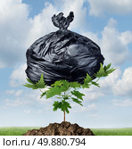 Power of nature environmental concept with a black plastic garbage bag being lifted and displaced by a powerful green tree sapling as a metaphor for determination  to remove pollution and save the environment. Стоковое фото, агентство Ingram Publishing / Фотобанк Лори