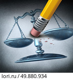 Injustice and discrimination as a legal system concept for breaking the law and performing unfair illegal acts as a pencil eraser erasing a justice scale as a metaphor for inequality and the stress of oppression. Стоковое фото, агентство Ingram Publishing / Фотобанк Лори
