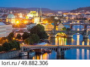 view of Bridges on Vltava, Prague at dusk, Czech Republic. Стоковое фото, агентство Ingram Publishing / Фотобанк Лори