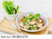 Thai Style Spicy Salmon salad with fresh vegetable. Стоковое фото, агентство Ingram Publishing / Фотобанк Лори