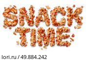 Snack time concept with a group of salty party snacks shaped as letters as a symbol of fatty food treats for watching TV or sports events as a delicious addictive choice but unhealthy option. Стоковое фото, агентство Ingram Publishing / Фотобанк Лори