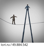 Career advantage business concept as a businessman walking on a high wire tightrope being passed by another better equiped person with long legs as a metaphor for personal skills. Стоковое фото, агентство Ingram Publishing / Фотобанк Лори