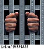 Moving violation concept as a traffic infraction or auromobile dependency symbol as human hands behind bars made of roads and highway streets as a drunk driving icon metaphor for transportation security and transport law. Стоковое фото, агентство Ingram Publishing / Фотобанк Лори