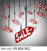 Price incentive retail business concept as a group of fishing hooks with a sale price tag bait attached to the lure as a shopping symbol for promoting attracting and tempting buying clients to be tempted by bargain prices. Стоковое фото, агентство Ingram Publishing / Фотобанк Лори