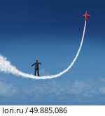Follow your dreams concept and motivational symbol as a businessman walking upward on a smoke trail created by a jet airplane as an icon for dreaming and aspiring for growth success. Стоковое фото, агентство Ingram Publishing / Фотобанк Лори