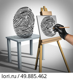 Identity theft concept as a criminal painting a copy of a fingerprint  as a security symbol for ID protection and protecting private data on the internet or personal servers. Стоковое фото, агентство Ingram Publishing / Фотобанк Лори